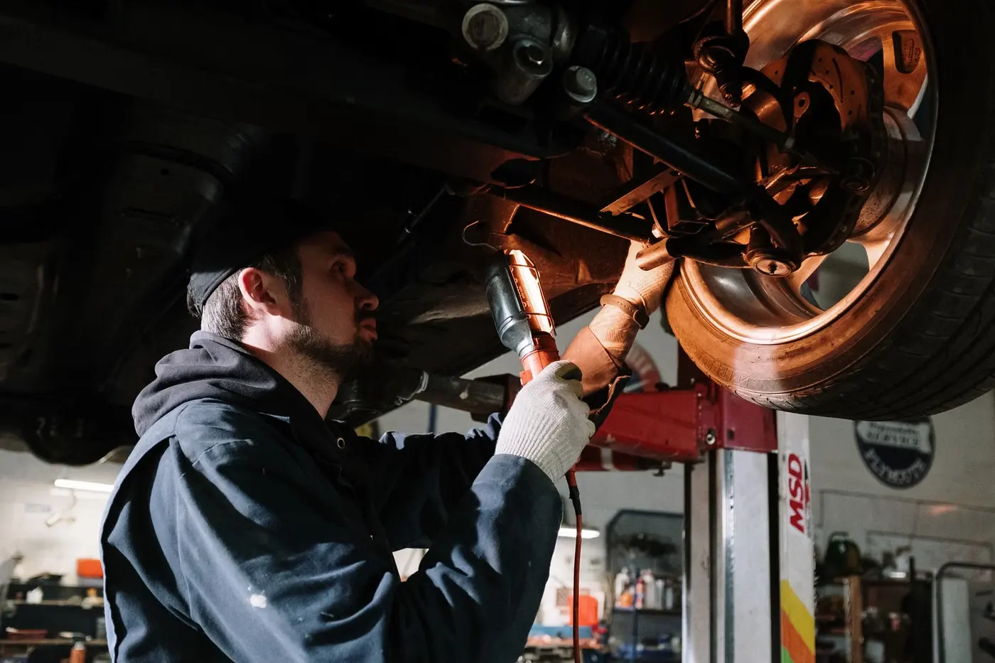Illustrative undercarriage service photo, not this job